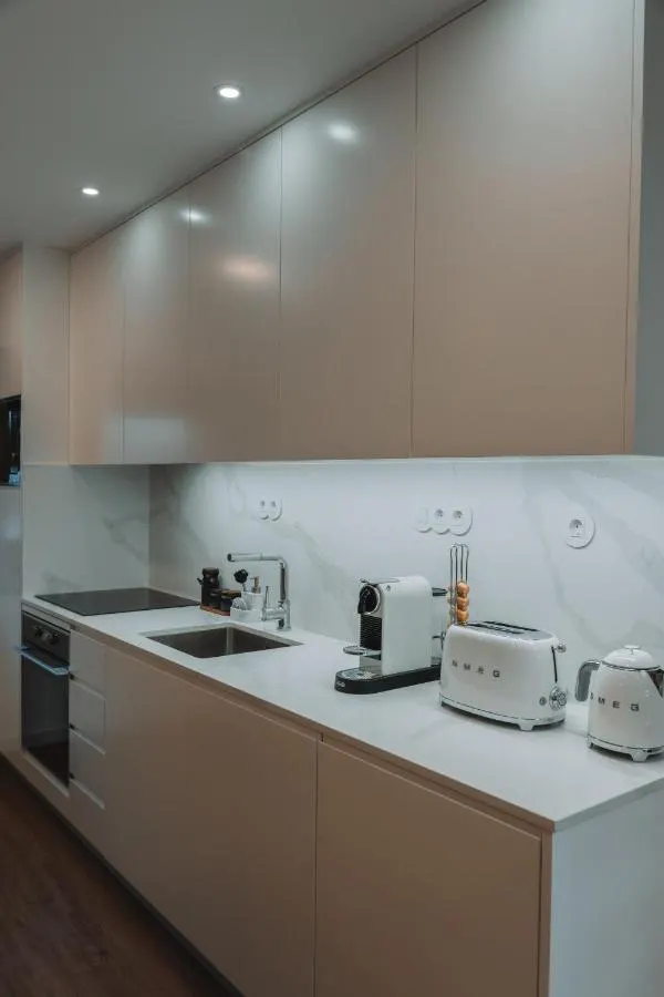 Cozinha equipada com electrodomésticos Smeg